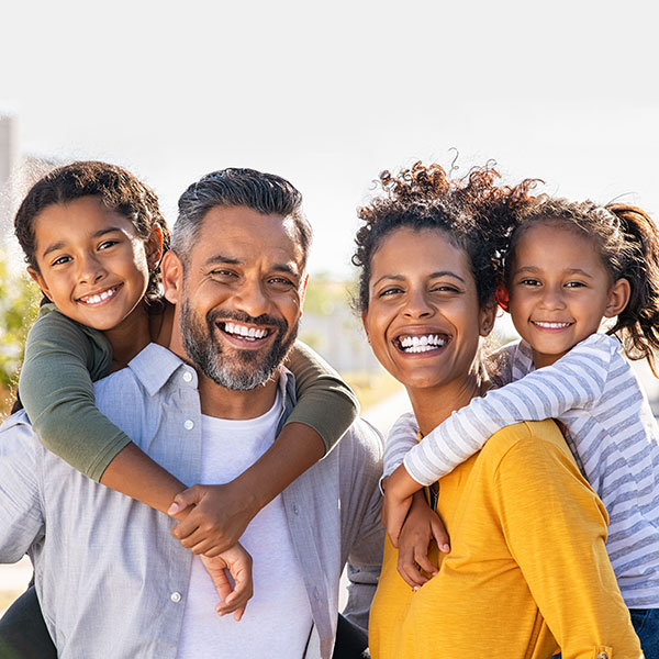 Family Smiling Outdoors